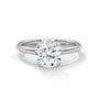 White metal solitaire engagement ring with round diamond and slim band