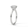 White metal solitaire ring with round center diamond, four-prong basket setting