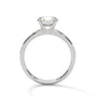 White metal solitaire ring with round center diamond and four-prong head