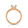 Yellow gold solitaire ring with round center diamond and four-prong head