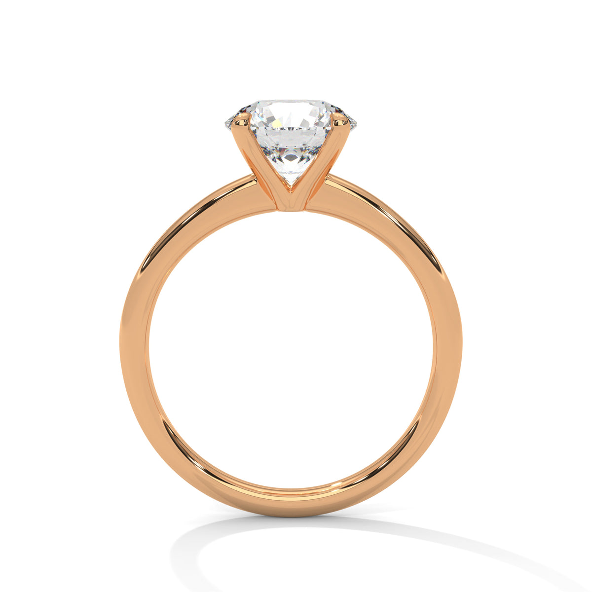 Yellow gold solitaire ring with round center diamond and four-prong head