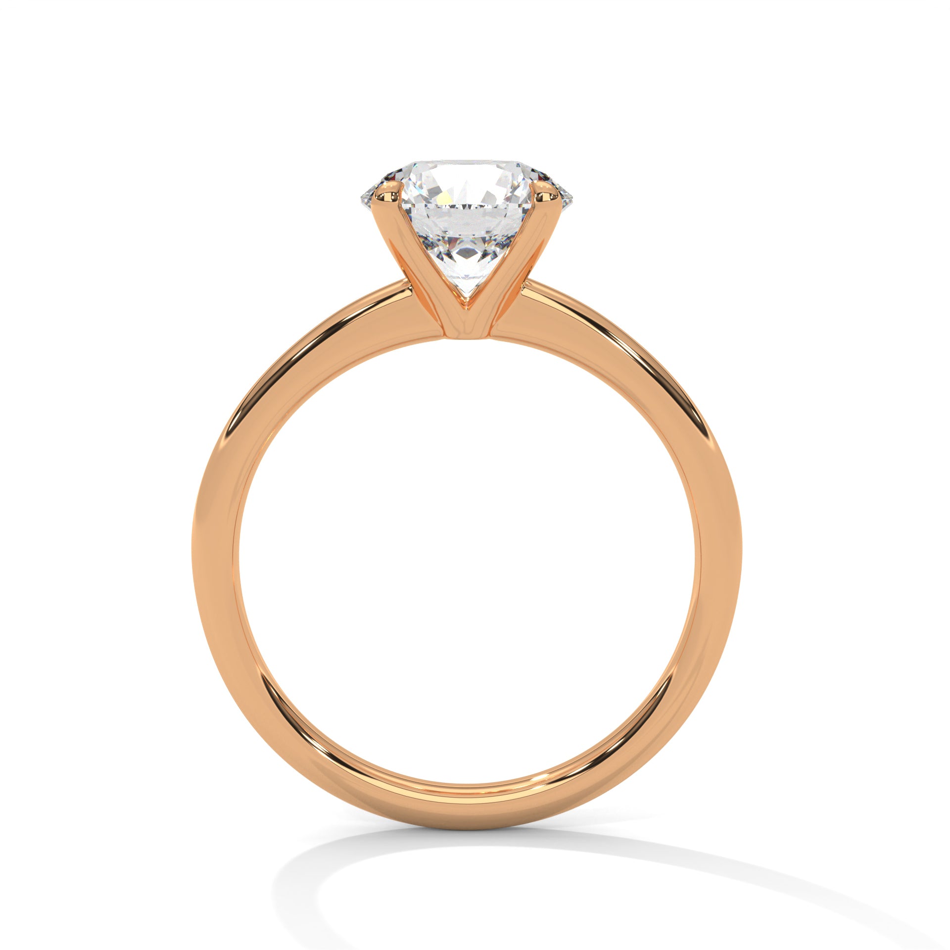 Yellow gold solitaire ring with round center diamond and four-prong head