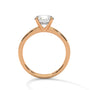 Yellow gold solitaire ring with round center diamond and four-prong head