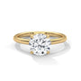 Yellow gold solitaire engagement ring, top view of round four-prong diamond setting