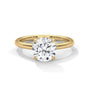Yellow gold solitaire engagement ring, top view of round four-prong diamond setting