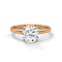 Yellow gold solitaire engagement ring with round diamond in four-prong setting