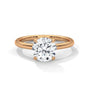 Yellow gold solitaire engagement ring with round diamond in four-prong setting