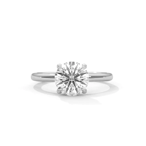 White gold round diamond solitaire ring with 4-prong setting