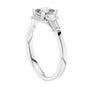 White gold radiant halo engagement ring with square center stone and side diamonds