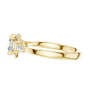 Yellow gold geometric halo ring, side profile with prong-set square stones