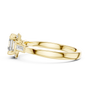 Yellow gold geometric halo ring, side profile with prong-set square stones