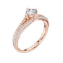 Rose gold pavé split-shank engagement ring with round center diamond, angled side view