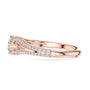 Rose gold pavé split-shank engagement ring with round center diamond, profile view