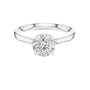 White gold solitaire engagement ring with round center diamond and hidden halo border