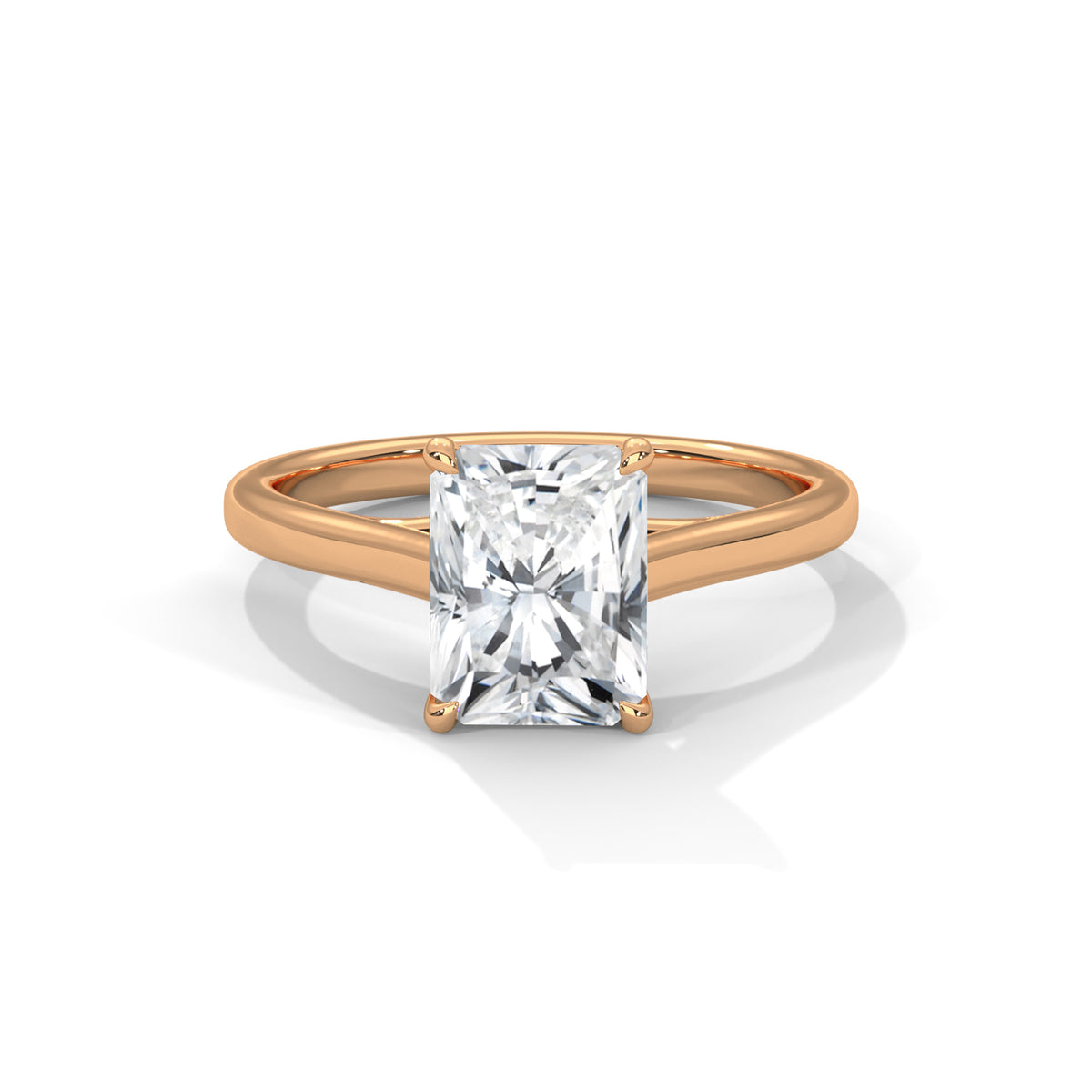 Yellow gold radiant-cut solitaire trellis ring, side view with raised square stone