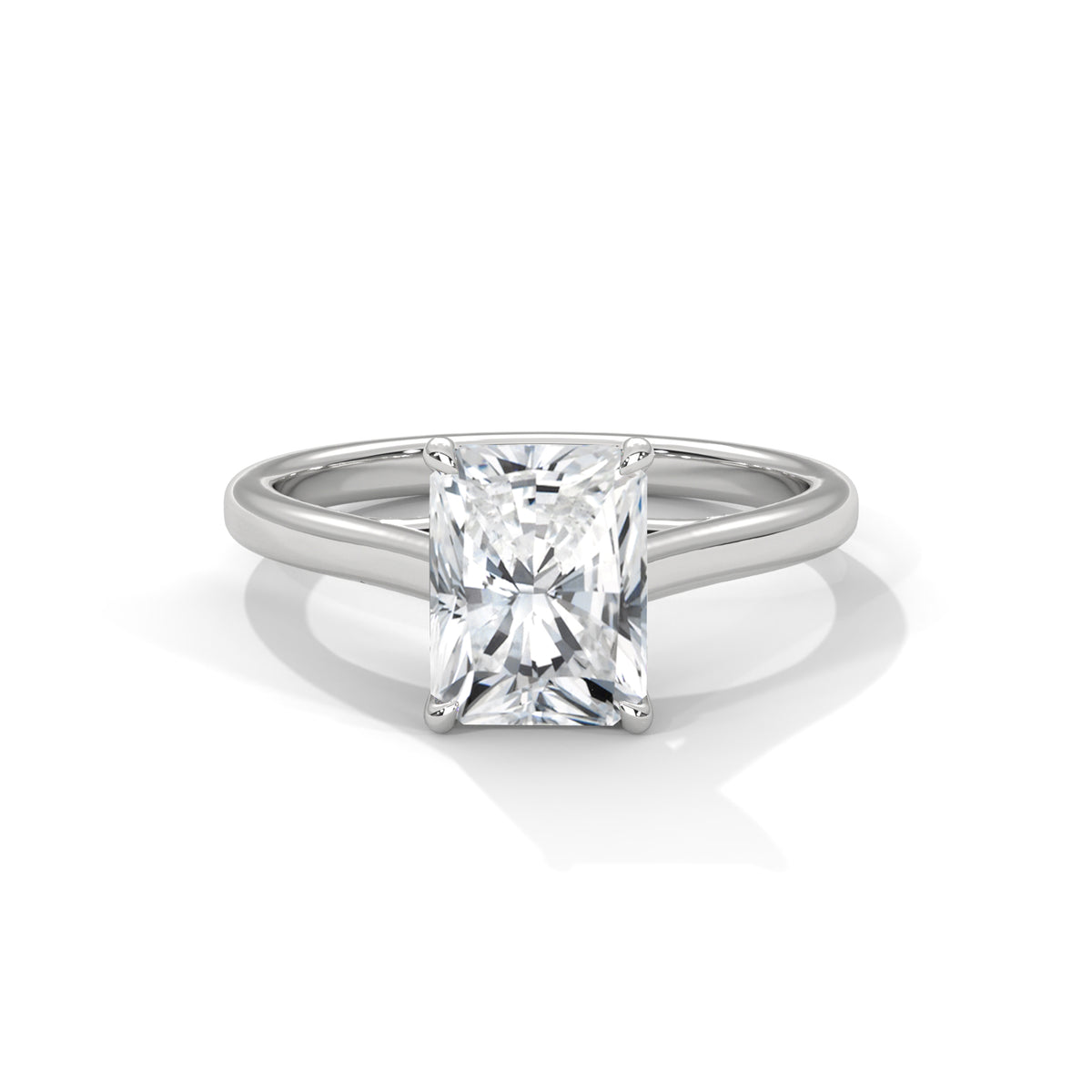 White gold radiant-cut solitaire trellis ring with square center diamond