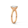 Rose gold radiant-cut solitaire trellis ring, side view showing prongs and stone