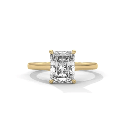 Yellow gold solitaire ring with square radiant-cut diamond and four prong setting