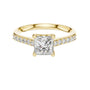 Yellow gold princess-cut diamond ring with pavé shoulders and center diamond.