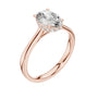 Rose gold engagement ring with oval center diamond and pavé halo band