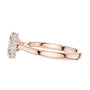 Rose gold oval diamond engagement ring, side view with slim split shank