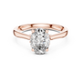 Rose gold oval diamond engagement ring with oval center stone and pavé details