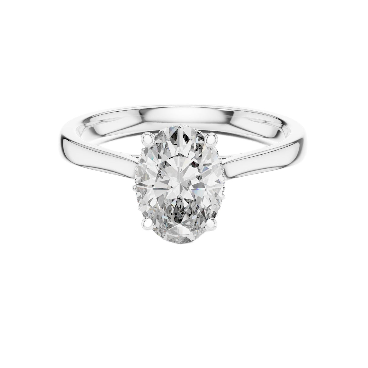 White gold oval diamond engagement ring with oval center stone and pavé shank