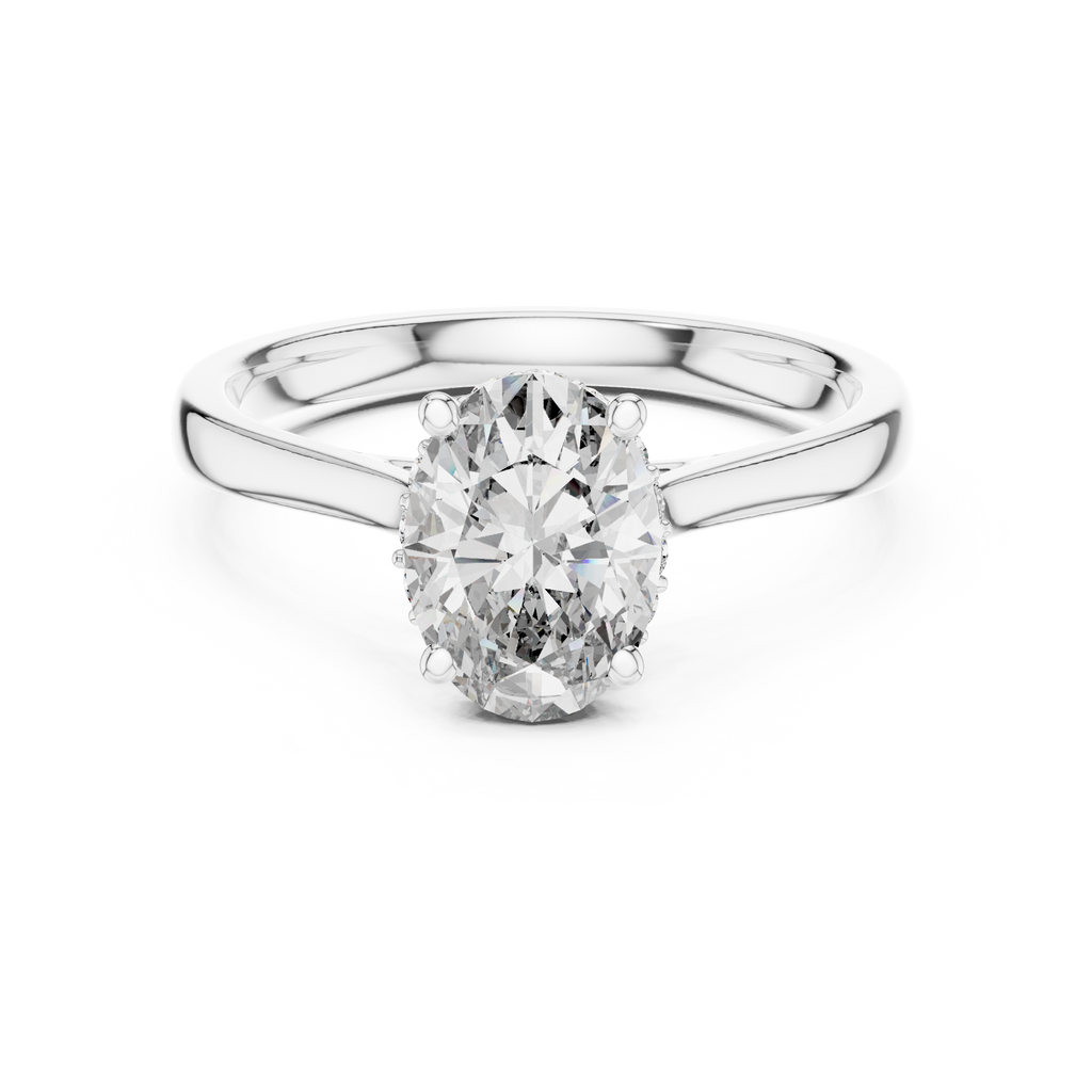 White gold oval diamond engagement ring with oval center stone and pavé shank