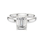 White gold emerald-cut solitaire diamond engagement ring with four-prong setting