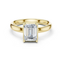 Yellow gold emerald-cut solitaire diamond engagement ring with four-prong setting