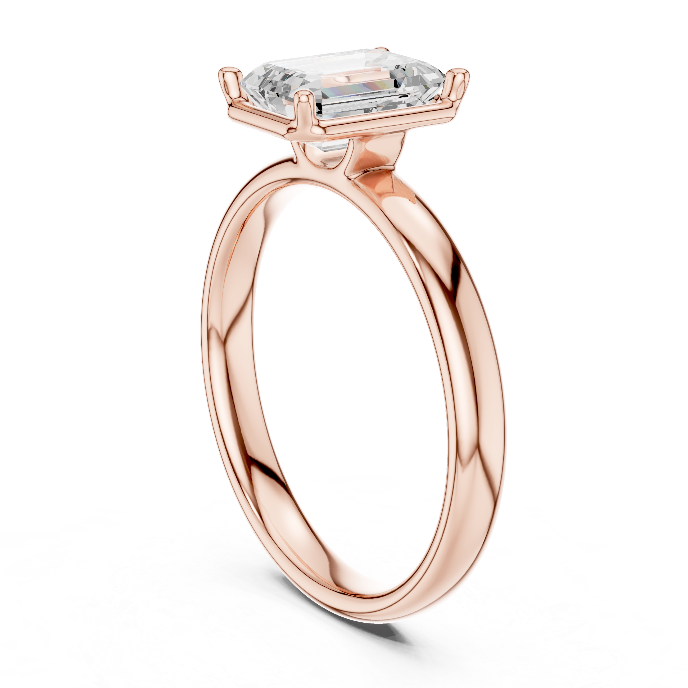 Rose gold emerald-cut solitaire diamond ring, side view with four-prong mount