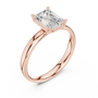 Rose gold emerald-cut solitaire diamond ring, angled view with four-prong setting