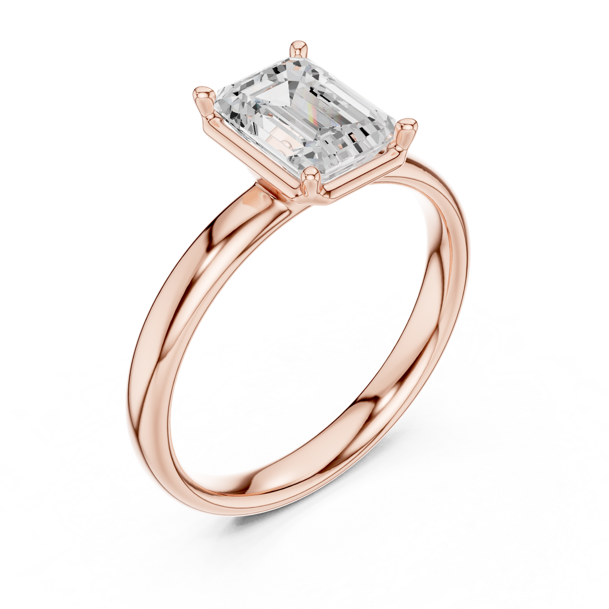 Rose gold emerald-cut solitaire diamond ring, angled view with four-prong setting