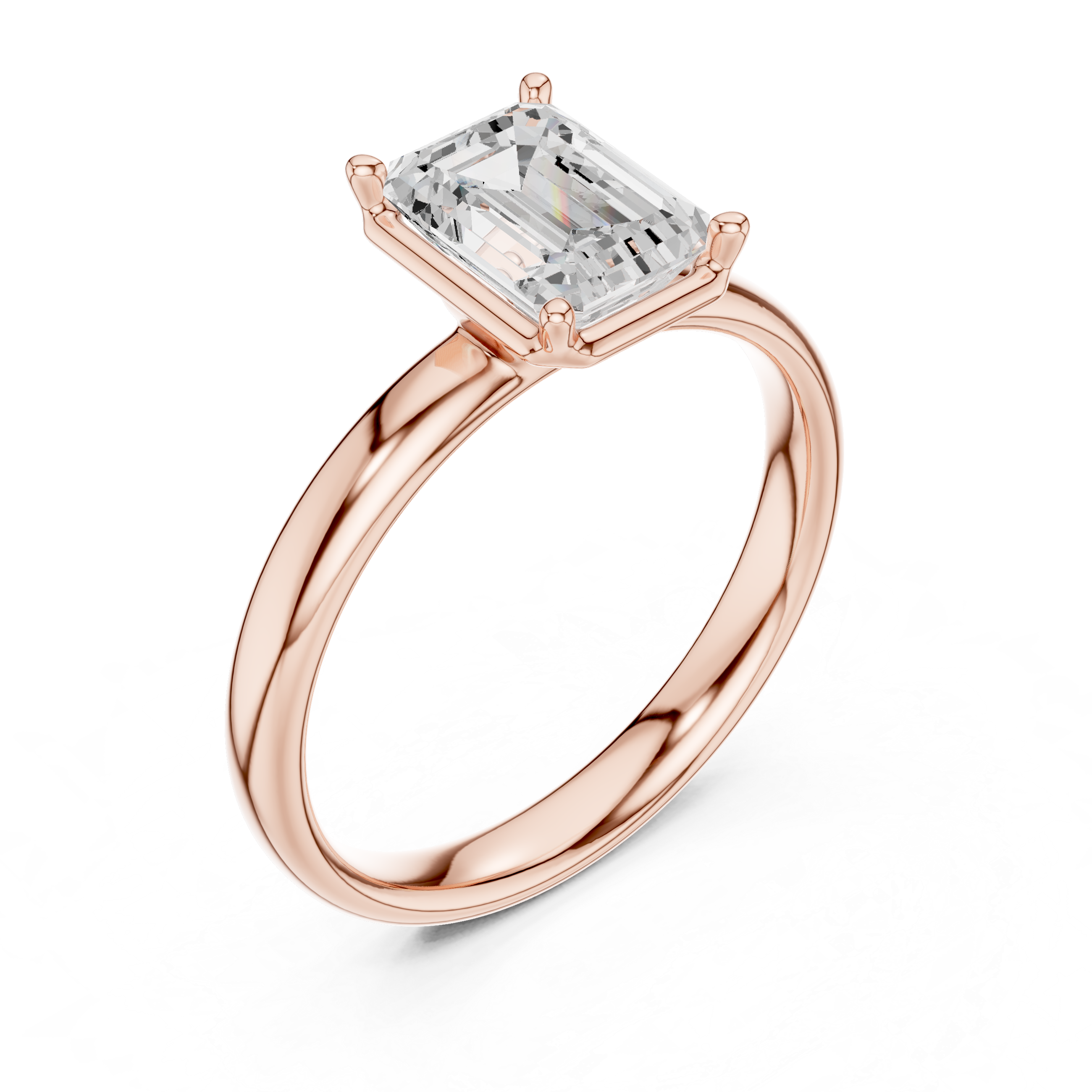 Rose gold emerald-cut solitaire diamond ring, angled view with four-prong setting