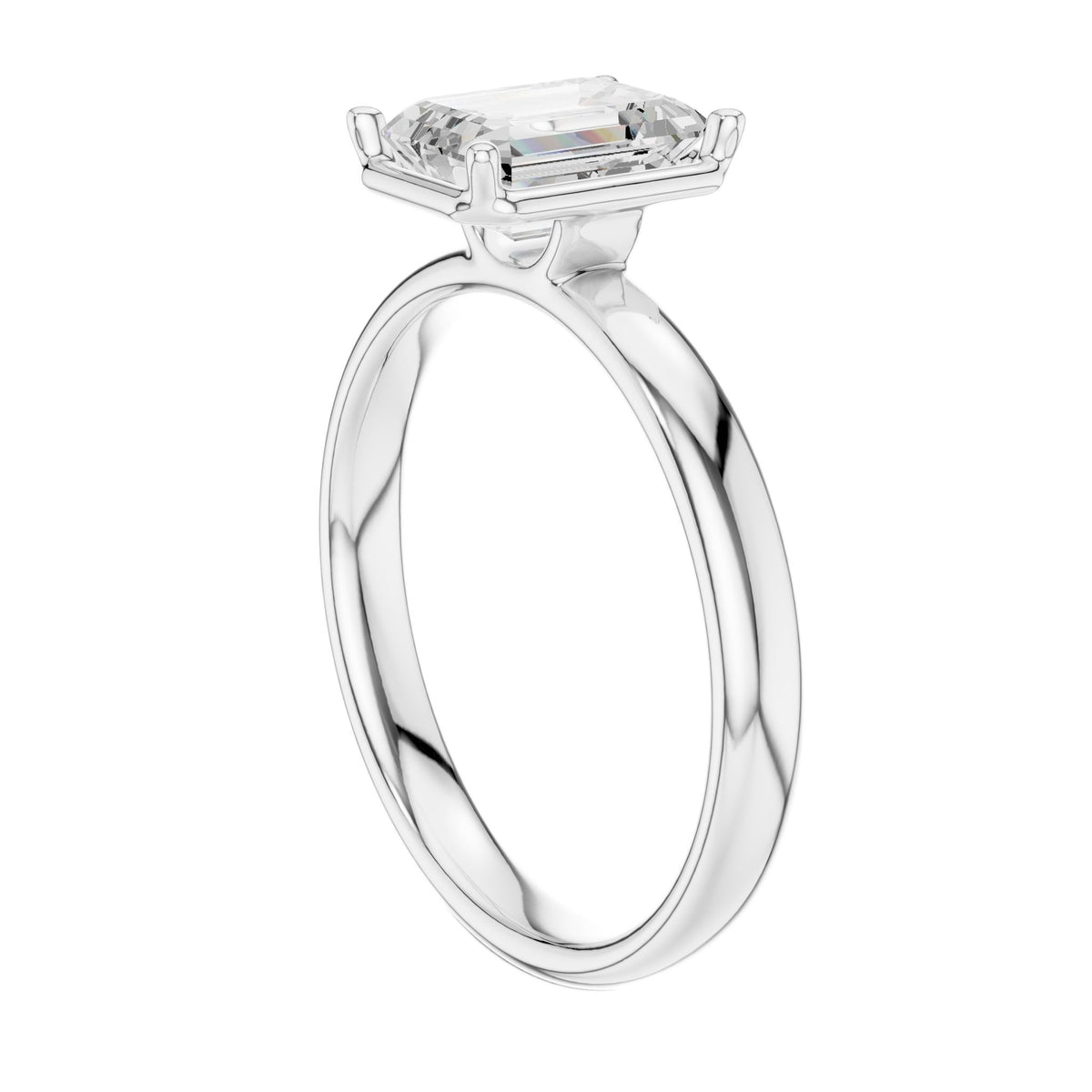 Platinum emerald-cut solitaire diamond ring with prong-set center stone