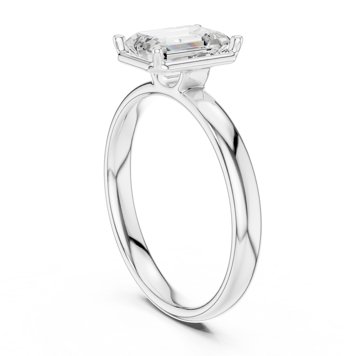 Platinum emerald-cut solitaire diamond ring with prong-set center stone