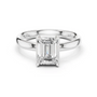 White gold emerald-cut solitaire diamond ring with four-prong center stone