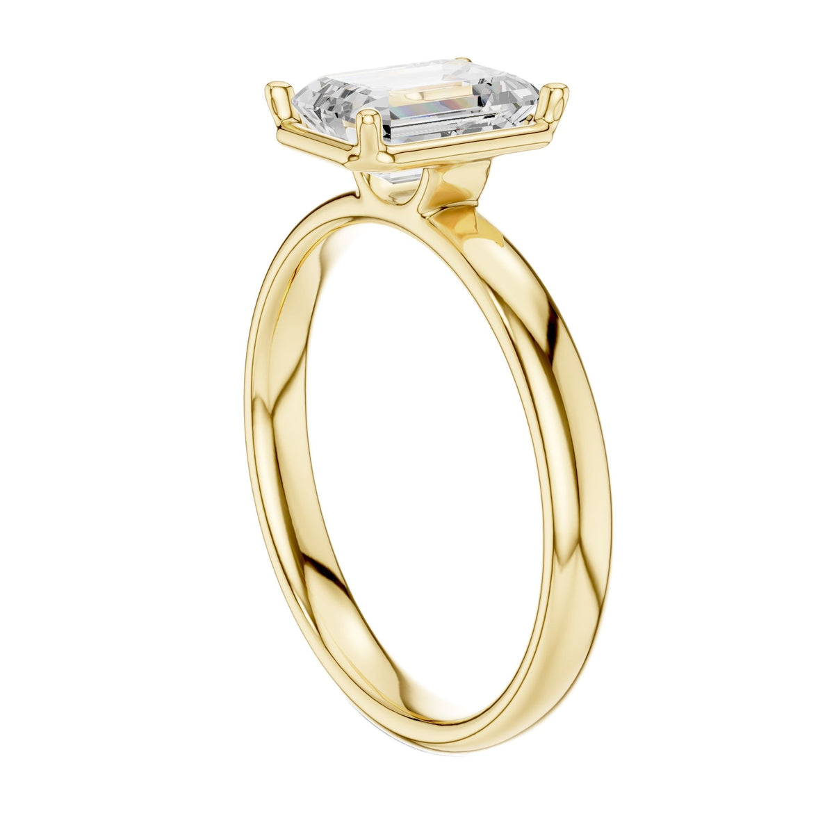 Yellow gold emerald-cut solitaire diamond ring with secure prong setting