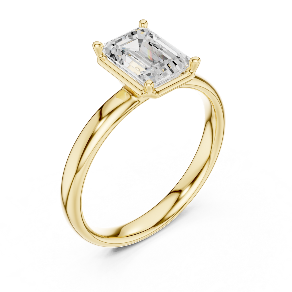 Emerald-cut diamond solitaire ring in yellow gold, three-quarter view with four-prong setting.