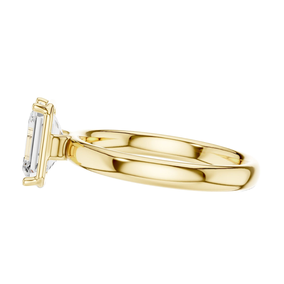 Yellow gold emerald-cut solitaire diamond ring side view with prong-set stone