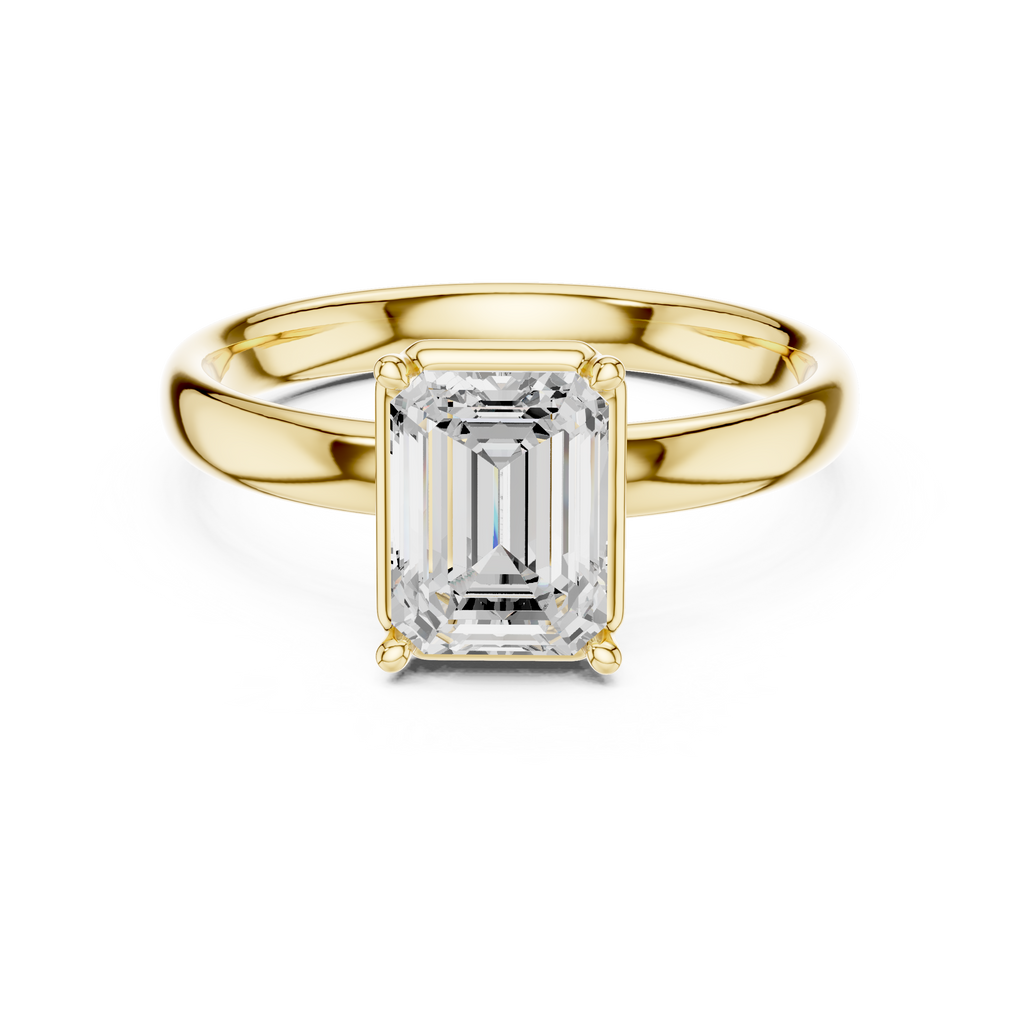 Emerald-cut diamond solitaire ring with yellow gold band and four-prong setting, front view.