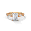 Yellow gold radiant cut diamond engagement ring with emerald-cut center and pave band