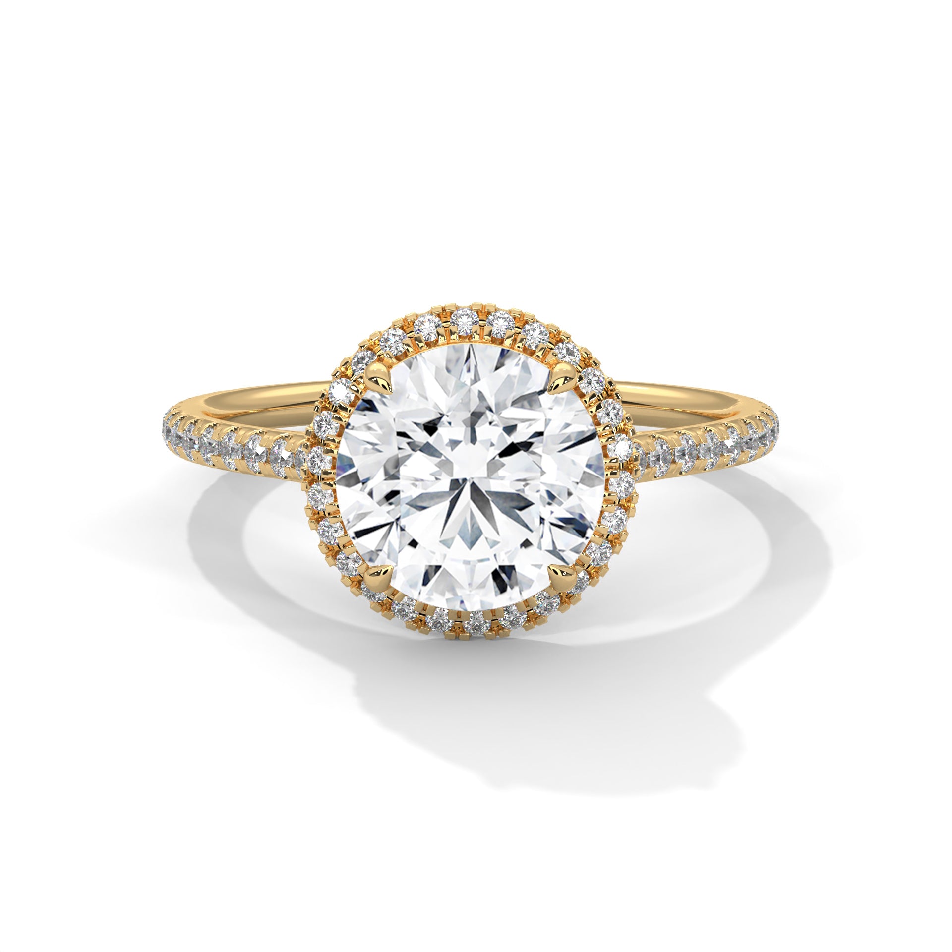 Round halo engagement ring with prong-set center stone, yellow gold tone and pavé diamonds