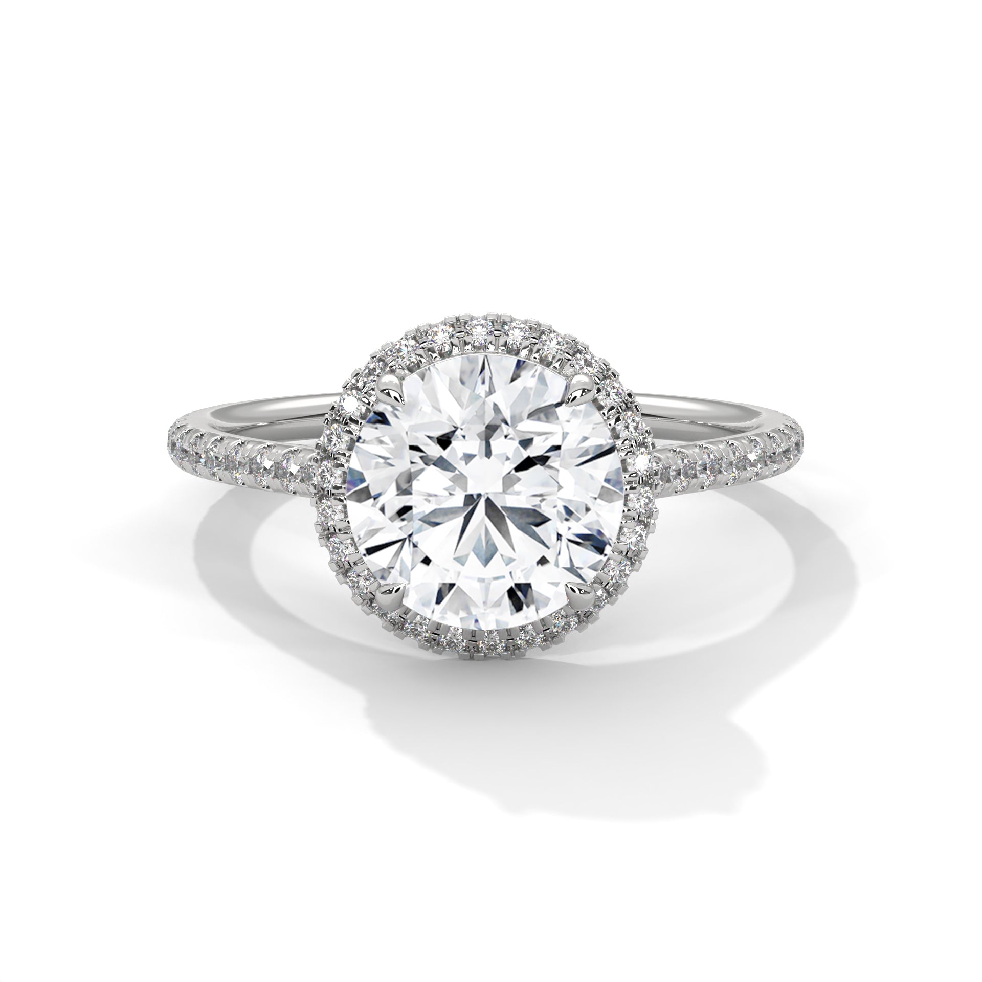 Round halo engagement ring with prong-set center stone, white metal and pavé diamond halo