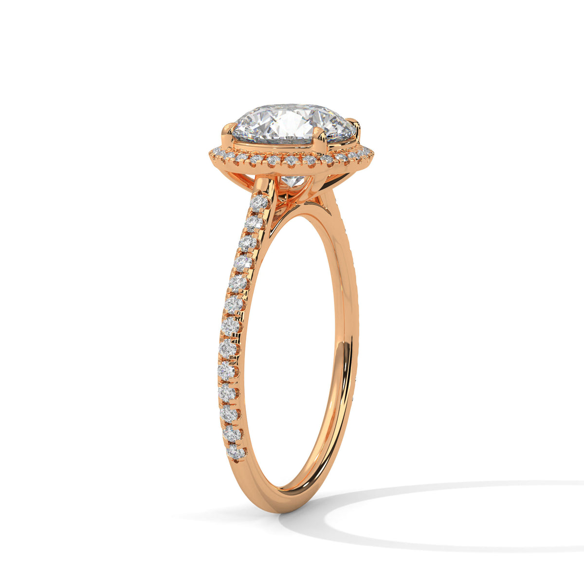 Round halo engagement ring with prong-set center stone, rose gold tone and pavé band