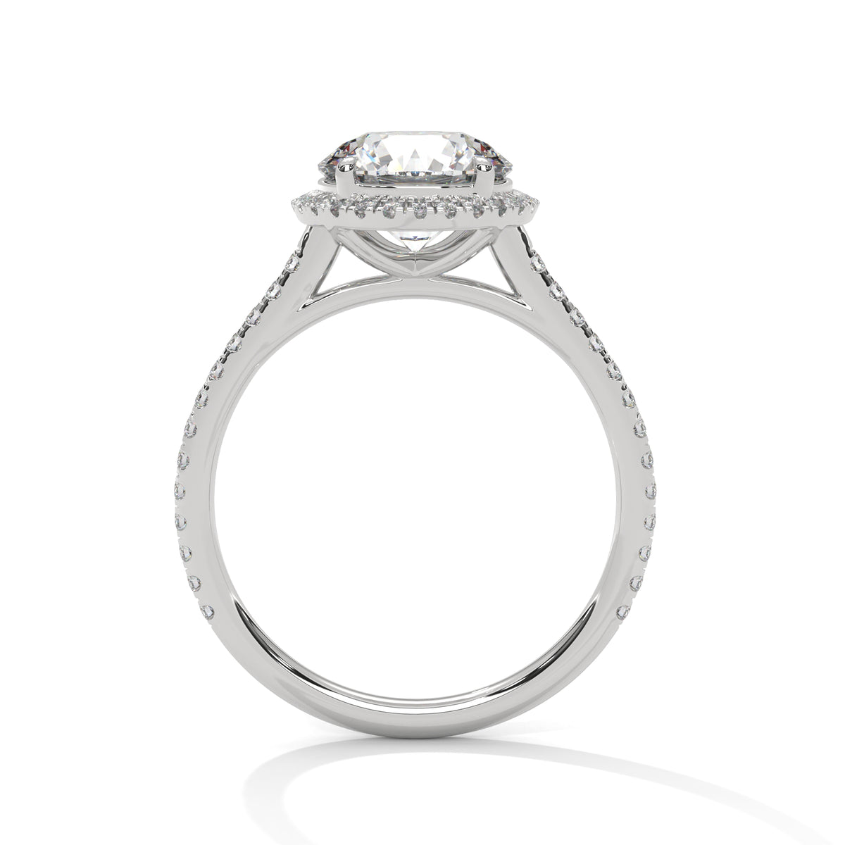 Round halo engagement ring with prong-set center stone, white metal and pavé details