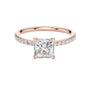 Rose gold princess-cut solitaire diamond ring with pavé side stones, four-prong setting
