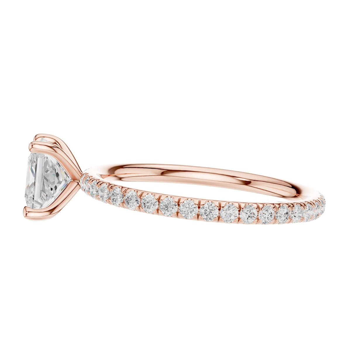 Rose gold princess-cut solitaire diamond ring with pavé band, side view, four-prong setting