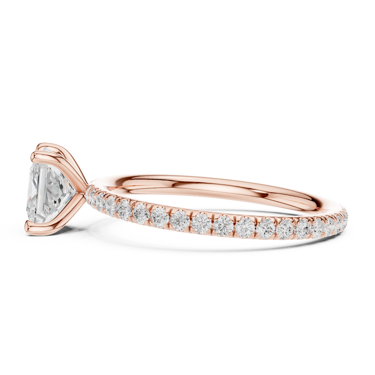 Rose gold princess-cut solitaire diamond ring with pavé band, side view, four-prong setting