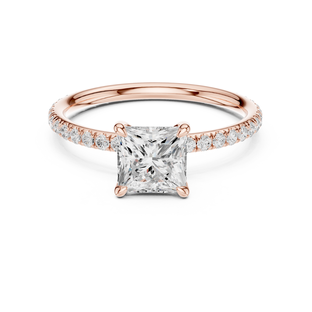 Rose gold solitaire engagement ring with princess center stone and diamond band